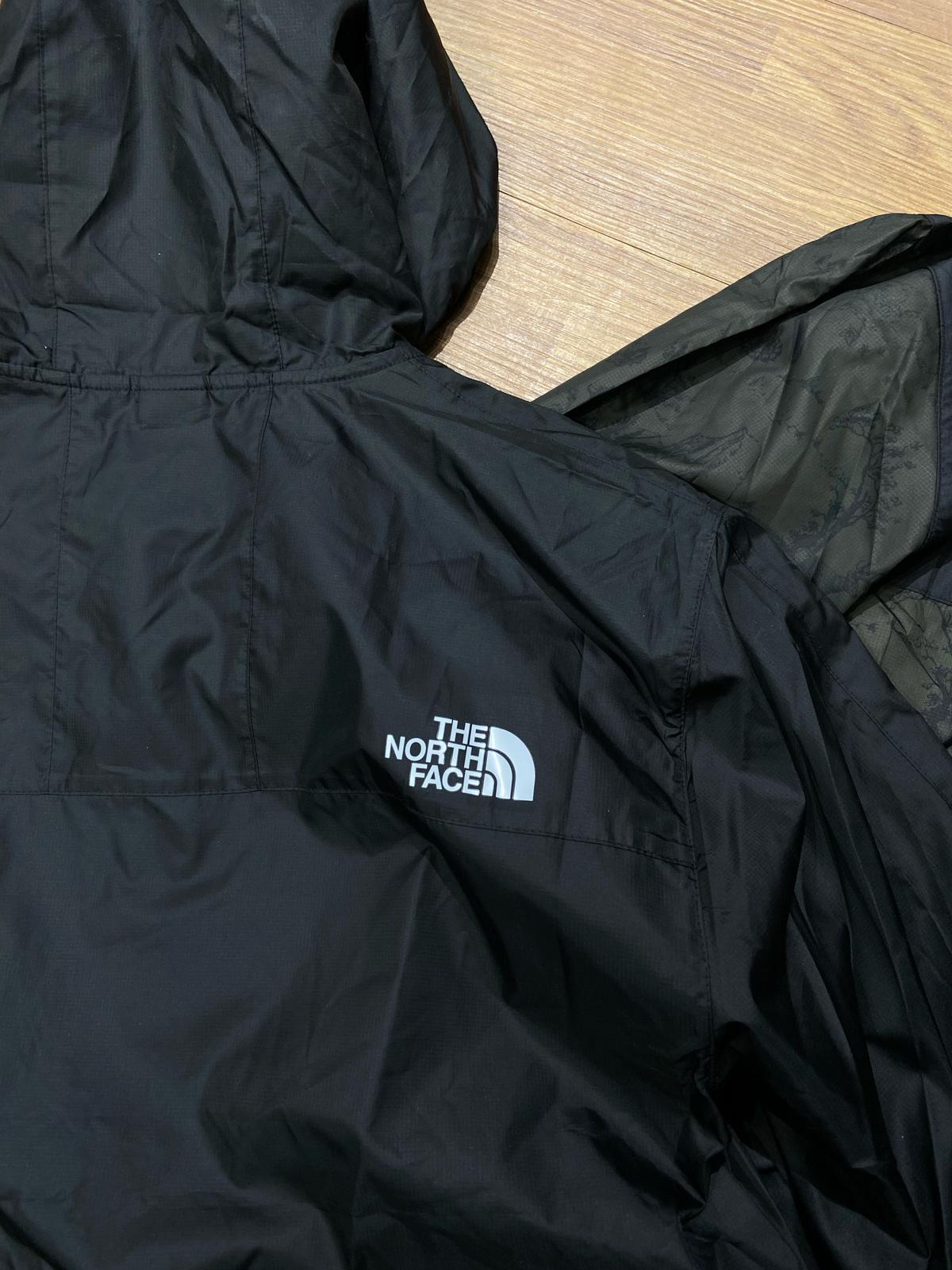 The North Face TNF 1985s Seasonal Mountain Lightweight Waterproof Jacket Black Woodland Green Camo