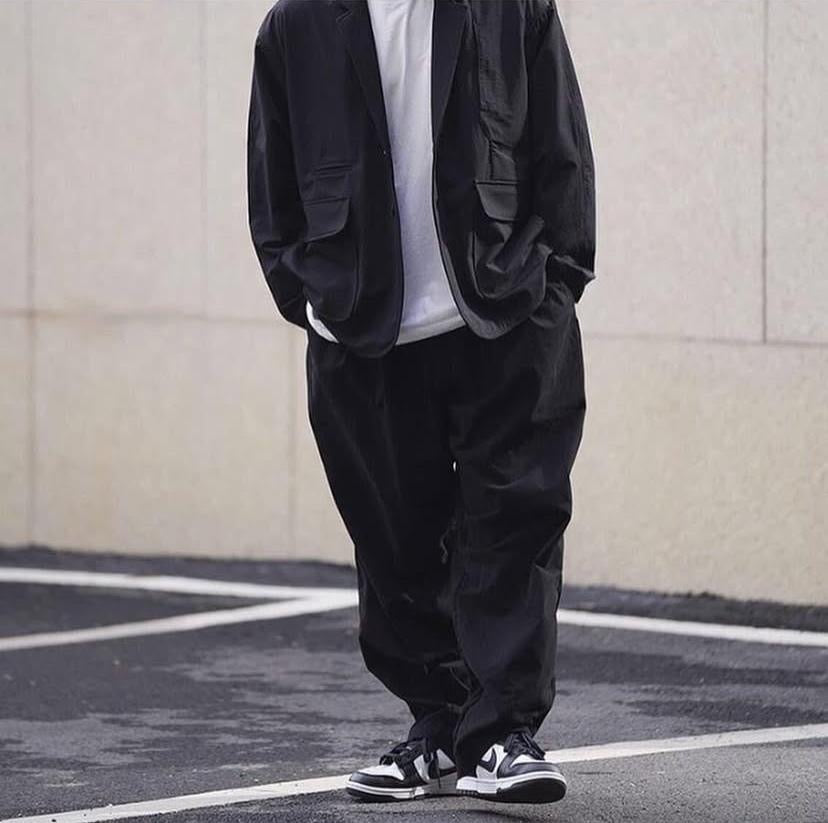 NORLN NR 2-Pleats Wide Chino Beige Black Cement