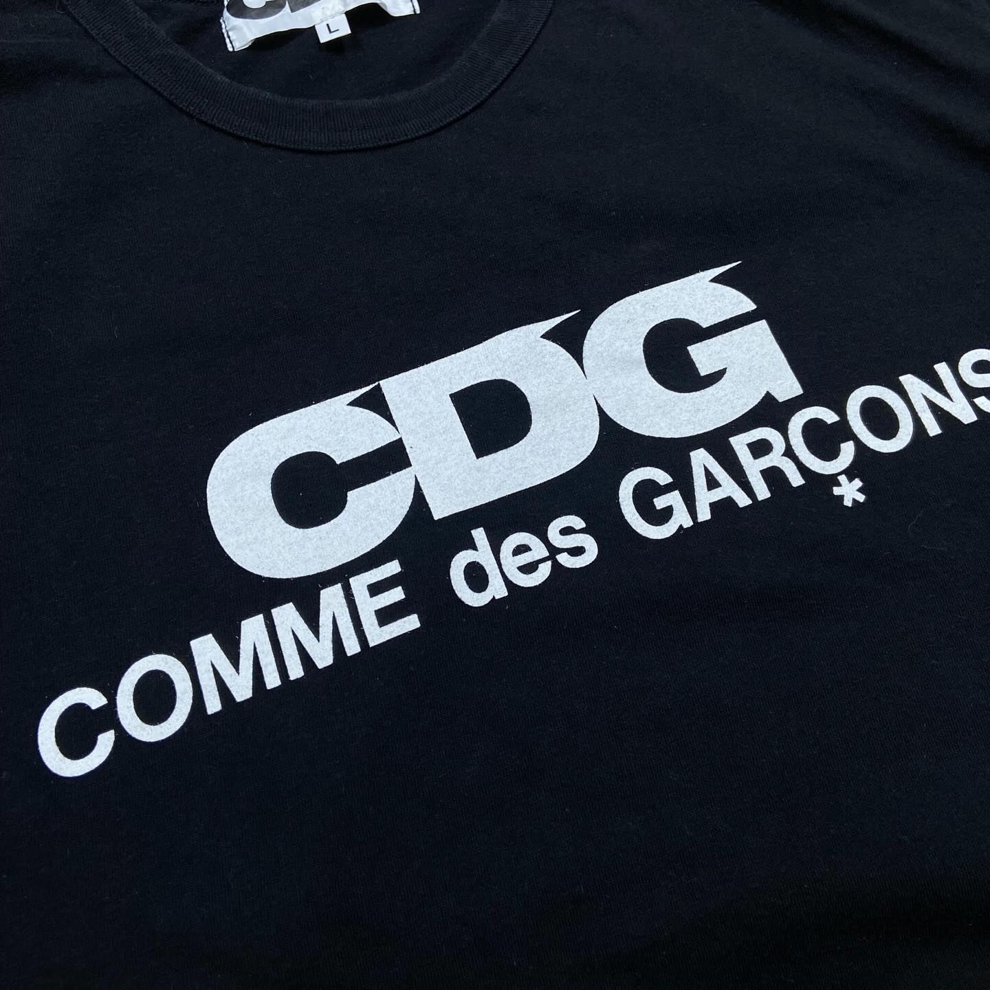 Comme des Garçons (CDG) CDG Scripts Tee “Made in Japan” Black Men (Used)