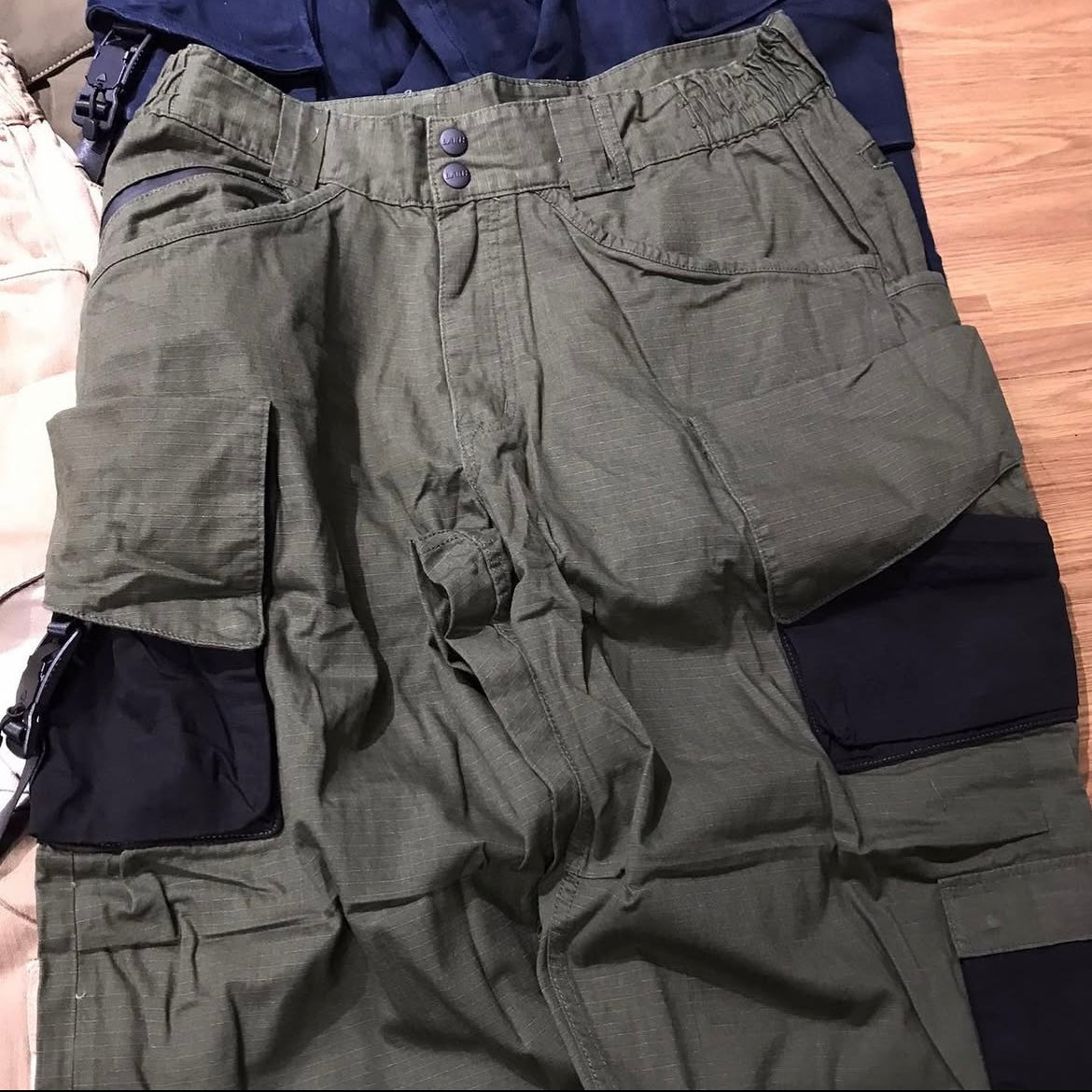 LAKH Supply 12 Pockets Cargo Pants ( Asymmetric Utility Worker Pants ) Nylon Olive SPC-NYOL Navy SPC-NAVY Herringbone Khaki SPC-HBKA Ripstop Olive/Black SPC-RSOB