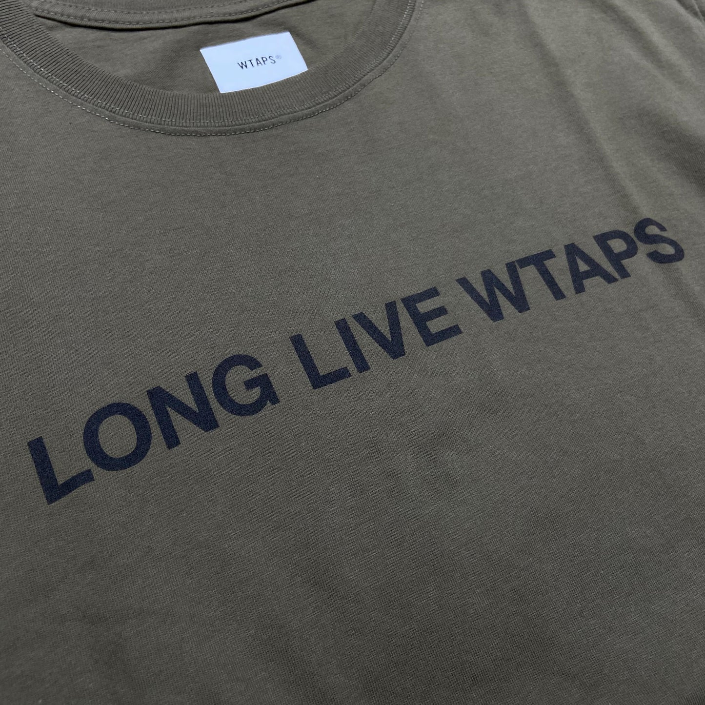 WTAPS LONG LIVE WTAPS SS / TEE COTTON. (Made in Japan) Olive Drab