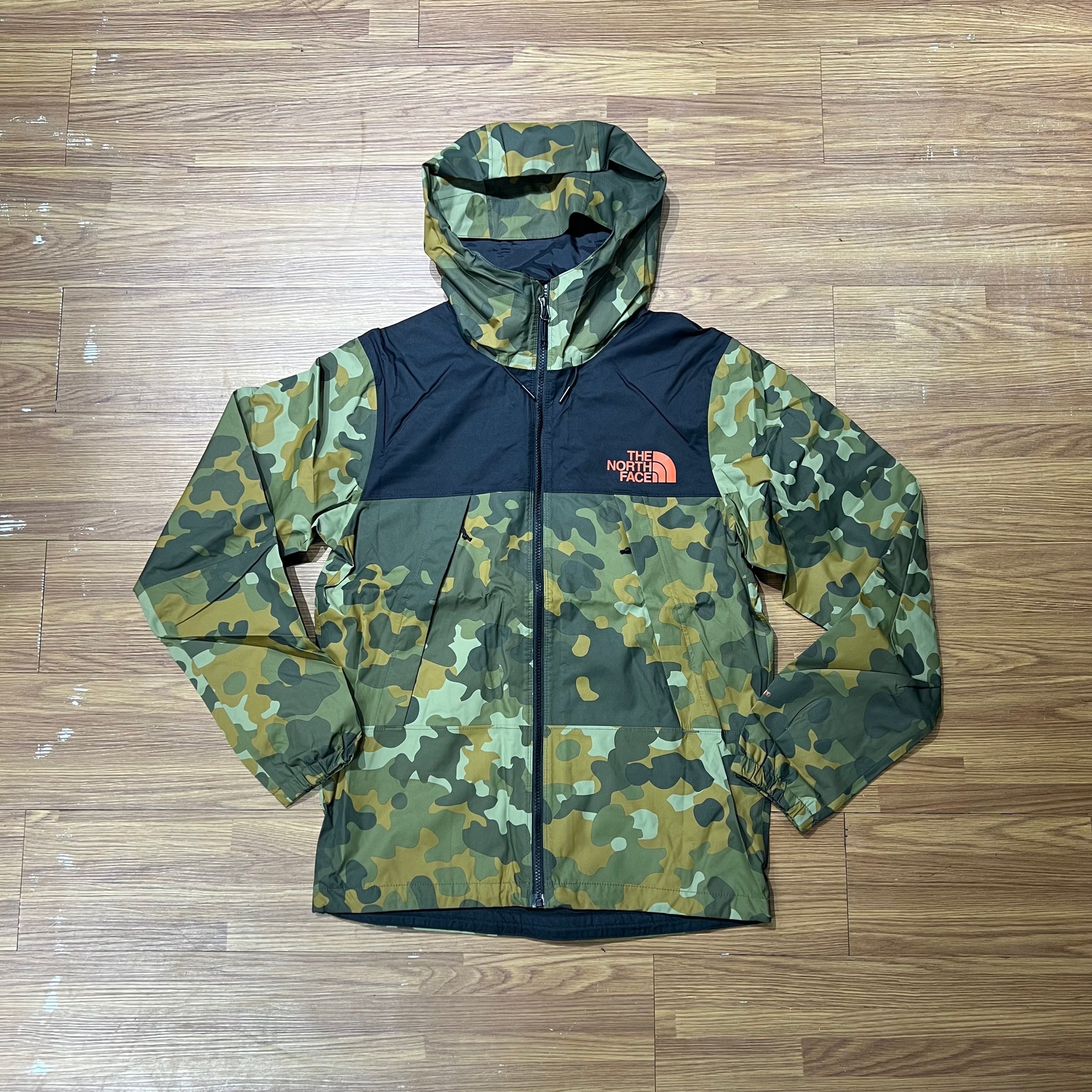 The North Face Camouflage jacket with a brand logo